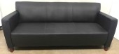 MODERN BLACK LEATHER SOFA WITH EXPOSED WOOD LEGS, MATCHING CHAIR AVAILABLE