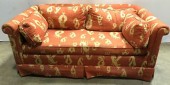 ORANGE PATTERNED LOVESEAT / SOFA, 4 PILLOWS INCLUDED