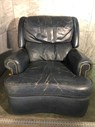 Aged Blue And Black Recliner