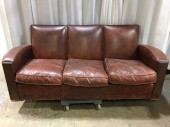 Vintage, Deco, Cigar Curved Armed Leather Sofa. 2 Matching Chairs Available.