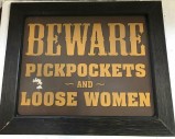 BEWARE PICKPOCKETS AND LOOSE WOMEN